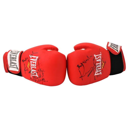 1054 - Signed by Kenneth EganBoxing: A pair of match worn Everlast size 14 Gloves, coloured red, each Signe... 