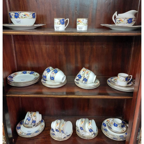 7 - A part porcelain Tea Set, by Grafton China & Sons, comprising cups, saucers, plates etc., decora... 