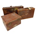 Two similar antique leather Suitcases, (labels of travel locations and hotels) together with a leath... 