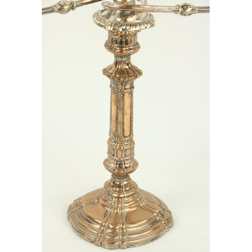 22 - A fine early pair of Sheffield silver plated two branch Candelabra, each with scrolling arms and urn... 