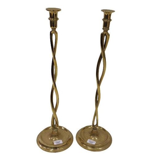 36 - A pair of early and unusual twisted Candlesticks, on bowl shaped circular bases, approx. 59cms (23''... 