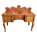An attractive 19th Century mahogany Sideboard, the gallery back with central carved pineapple cartou... 