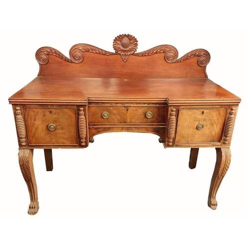 34 - An attractive 19th Century mahogany Sideboard, the gallery back with central carved pineapple cartou... 