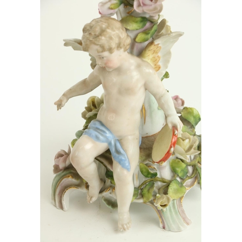 42 - An attractive pair of Sitzendorf porcelain Candelabra, each with three flower encrusted arms and a c... 