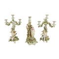 An attractive pair of Sitzendorf porcelain Candelabra, each with three flower encrusted arms and a c... 