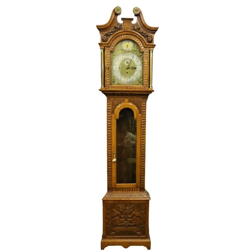48 - A 19th Century oak framed Grandfather Clock, the swan neck pediment with circular ormolu mounts over... 