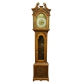 A 19th Century oak framed Grandfather Clock, the swan neck pediment with circular ormolu mounts over... 