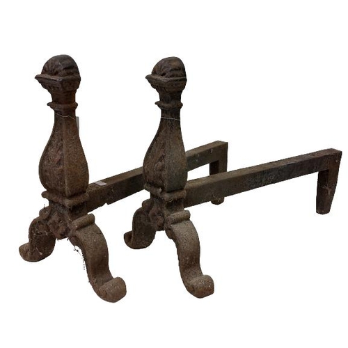 50 - A pair of very heavy cast iron Andirons, each with scroll cast front on cast arched scroll legs with... 