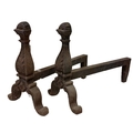 A pair of very heavy cast iron Andirons, each with scroll cast front on cast arched scroll legs with... 
