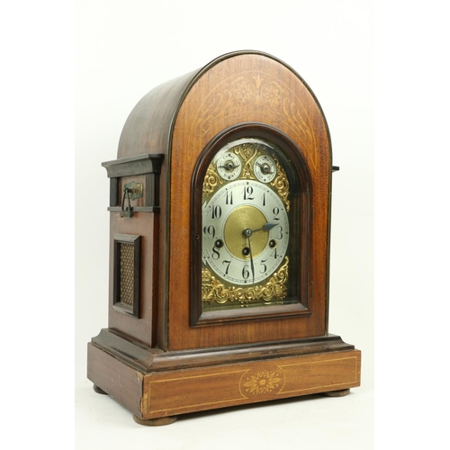 52 - An Edwardian marquetry inlaid chiming dome top Bracket Clock, the brass and silverised dial with Ara... 