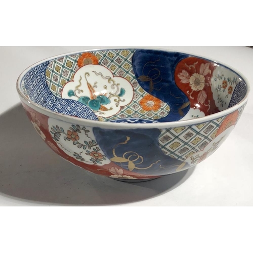 77 - An attractive 19th Century Imari Fruit Bowl, decorated with floral design and fruit, approx. 25cms (... 