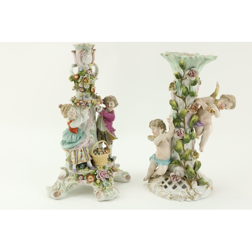 96 - A Sitzendorf porcelain Table Lamp, with flowers and two cupids surmounted; and a Sitzendorf Centerpi... 