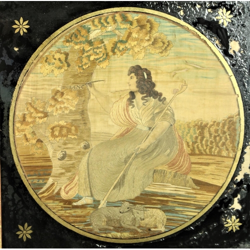 135 - An early 19th Century silk Needlework  Picture, depicting 'Shepherdess by a Tree,' tondo 12'' (30cms... 