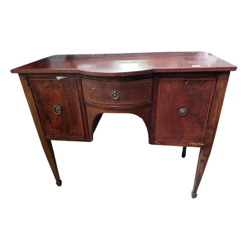 1 - A small bow fronted inlaid mahogany Sideboard, in the George III style, 20th Century, with frieze dr... 