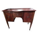 A small bow fronted inlaid mahogany Sideboard, in the George III style, 20th Century, with frieze dr... 