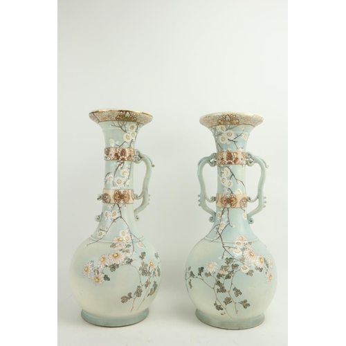 160 - A pair of Japanese two handled Satsuma Vases, (one lacking a handle) each with a long neck with flar... 