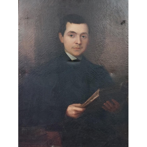 197 - J.B. Brennan, A.R.H.A. (1825-1889)'Portrait of a Young Cleric, holding a book seated by a table,' O.... 