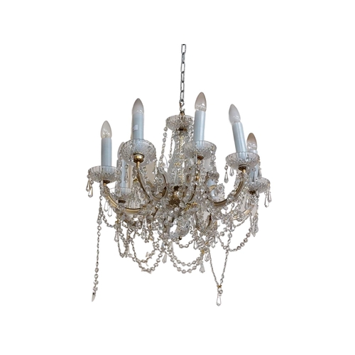 449 - A suite of 3 - 8 branch crystal Chandeliers, decorated with multiple droplets and links (O.R.M.), ea... 