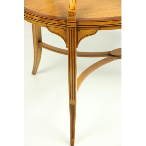 463 - A two tier Edwardian satinwood inlaid and crossbanded Supper Table, with oval shelves, the top with ... 