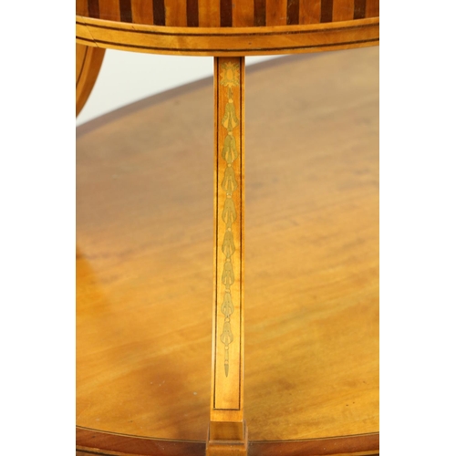 463 - A two tier Edwardian satinwood inlaid and crossbanded Supper Table, with oval shelves, the top with ... 