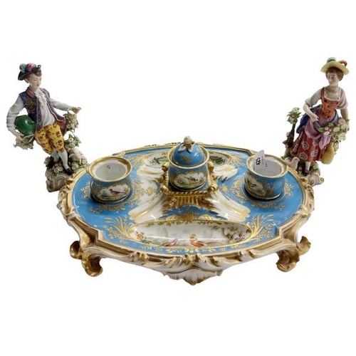 425 - A 19th Century Continental blue ground gilt highlighted bird decorated Serves type porcelain Desk Co... 