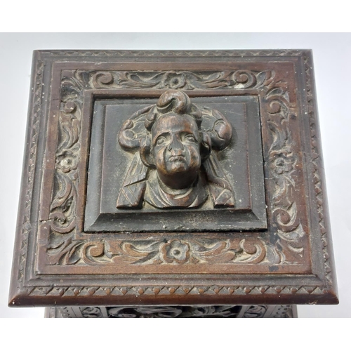 431 - An early German oak carved and pierced Nuremberg type Alms Box, with lift top depicting cherub ... 