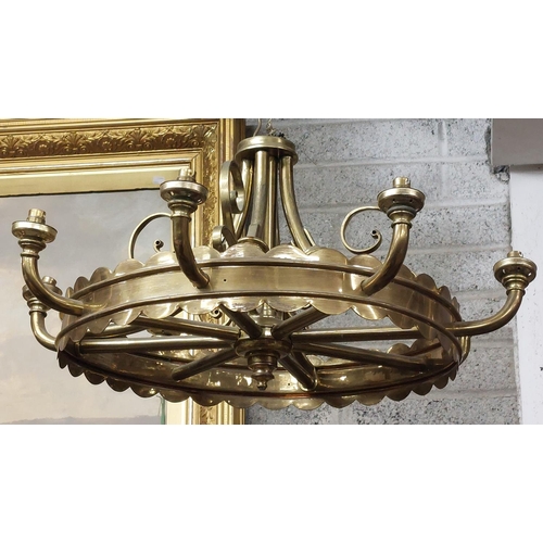 453 - A large matching pair of heavy brass 8 lamp wheel shaped Ceiling Lights, with scroll decoration, app... 