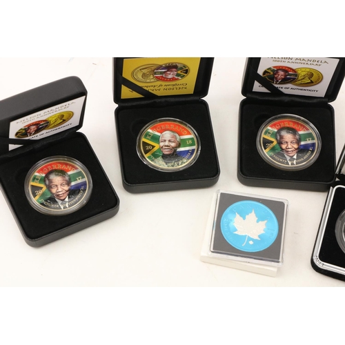 887 - Commemorative Coins: Two cased enamelled decorative Nelson Mandela 100th Anniversary 1 ounce silver ... 