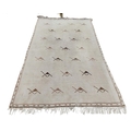 A large heavy pile Middle Eastern fawn ground woollen Carpet, with geometric design and slim border,... 