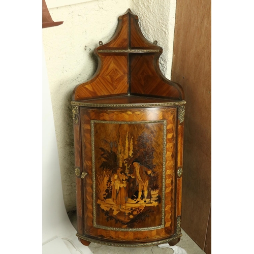 189 - An exceptional pair of late 19th Century French kingwood and marquetry Hanging Corner Cupboards, wit... 