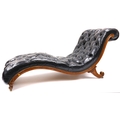 A Victorian rosewood Daybed, serpentine shaped 'S' scroll design covered in black deep button leathe... 