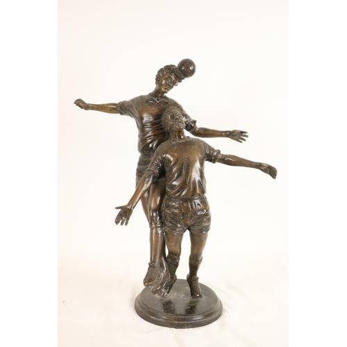 163 - A heavy bronze Group, modelled with two Footballers in action pose, approx. 56cms (22