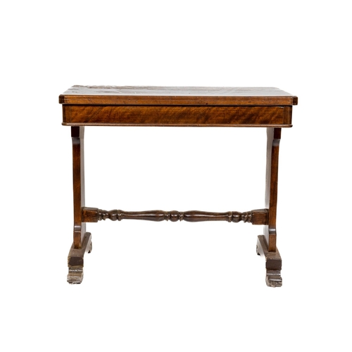 187 - A rectangular walnut Side Table, with canted corners, above a plain frieze on shaped standard suppor... 