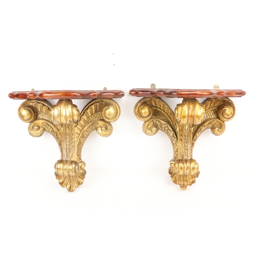 198 - A good pair of mahogany and parcel gilt Wall Brackets, with serpentine shaped moulded shelf supporte... 