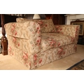 A good pair of floral covered two seater Settees, each with cushion back and seat, 155cms (61