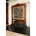 A Victorian mahogany cheval Firescreen, with tapestry panel depicting a dove above a turned stretche... 