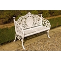 An extremely heavy pair of cast iron two seater Garden Benches, each pierce back with scrolling foli... 