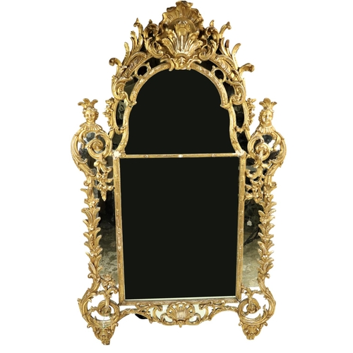 74 - An attractive and large early 18th Century French giltwood Mirror Overmantel, probably R. Gence, c. ... 