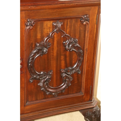 68 - An Edwardian Chippendale style mahogany Sideboard, of inverted breakfront outline, and two centre dr... 