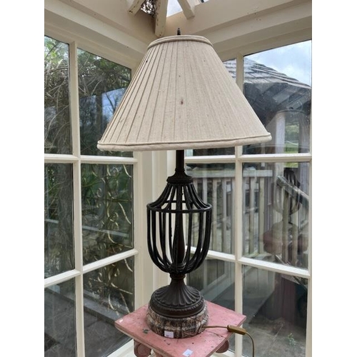 531 - A set of three heavy bronzed metal vase shaped open work tubular Table Lamps, with oatmeal coloured ... 