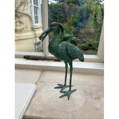 540 - A small bronze Model of Crane Bird, with fish, on mount, approx. 30cms (12