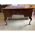 A good Queen Anne style walnut and birds eye walnut Dressing Table, 19th Century, with crossbanded r... 