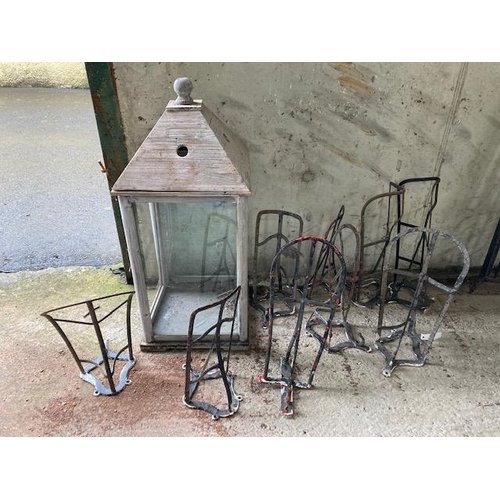 574 - A collection of 9 varied design Wall Mounted Saddle Holders, and a wooden frame Lantern Holder. (10)... 