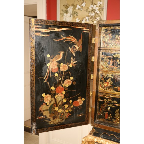 94 - An exceptional fine 18th Century chinoiserie lacquered two door Cabinet on Stand, the interior with ... 