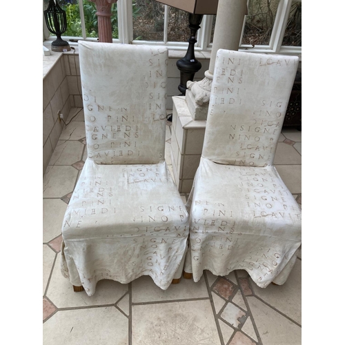 539 - A good set of 10 Dining Chairs, covered in beige fabric by the Sofa Factory, each with tall padded b... 