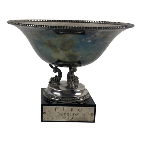10 - An attractive Sterling silver Trophy Bowl, with circular bead edge on a tri-dolphin support on squar... 