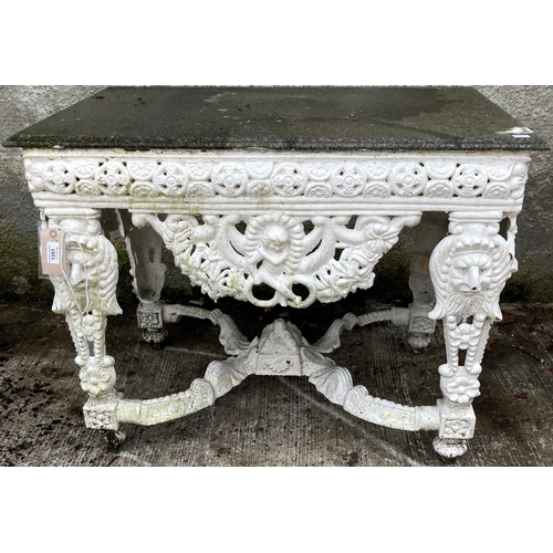 1351 - A very unusual 19th Century cast iron Garden or Patio Table, the four legs and frieze cast with clas... 