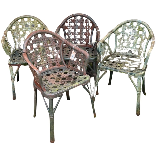 1353 - A good set of 4 unusual green painted 'basket weave' cast iron Patio Armchairs, each with an arched ... 