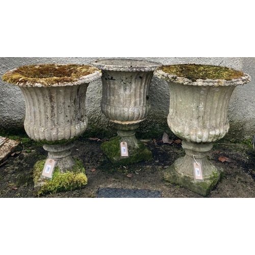 1356 - A set of 3 composition stone Garden Urns, of campana form, each on square stem base, one as is, 58cm... 