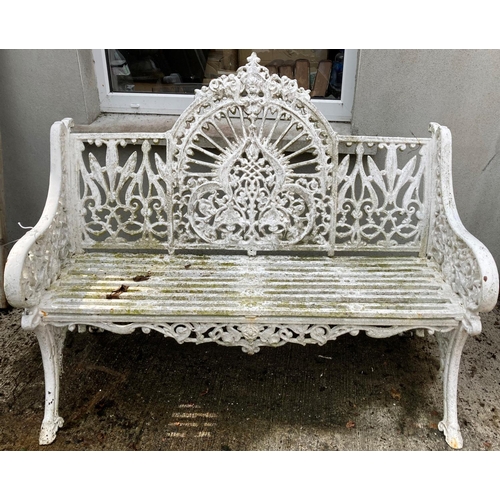 1357 - An attractive cast iron Pierce type Garden Bench, with arched and pierced peacock tail back and iron... 